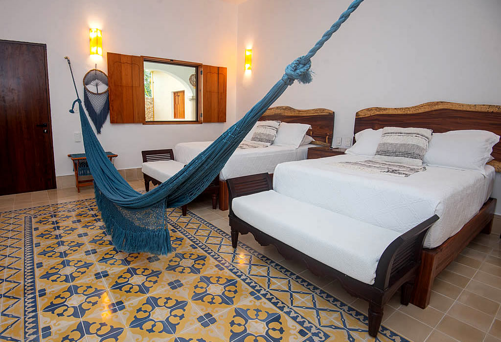 Habitación Superior con dos camas matrimoniales